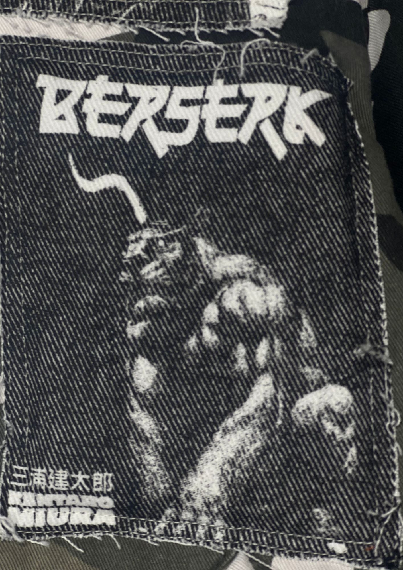 Rough Simmons x Berserk The Swordsman Patched Bomber Jacket