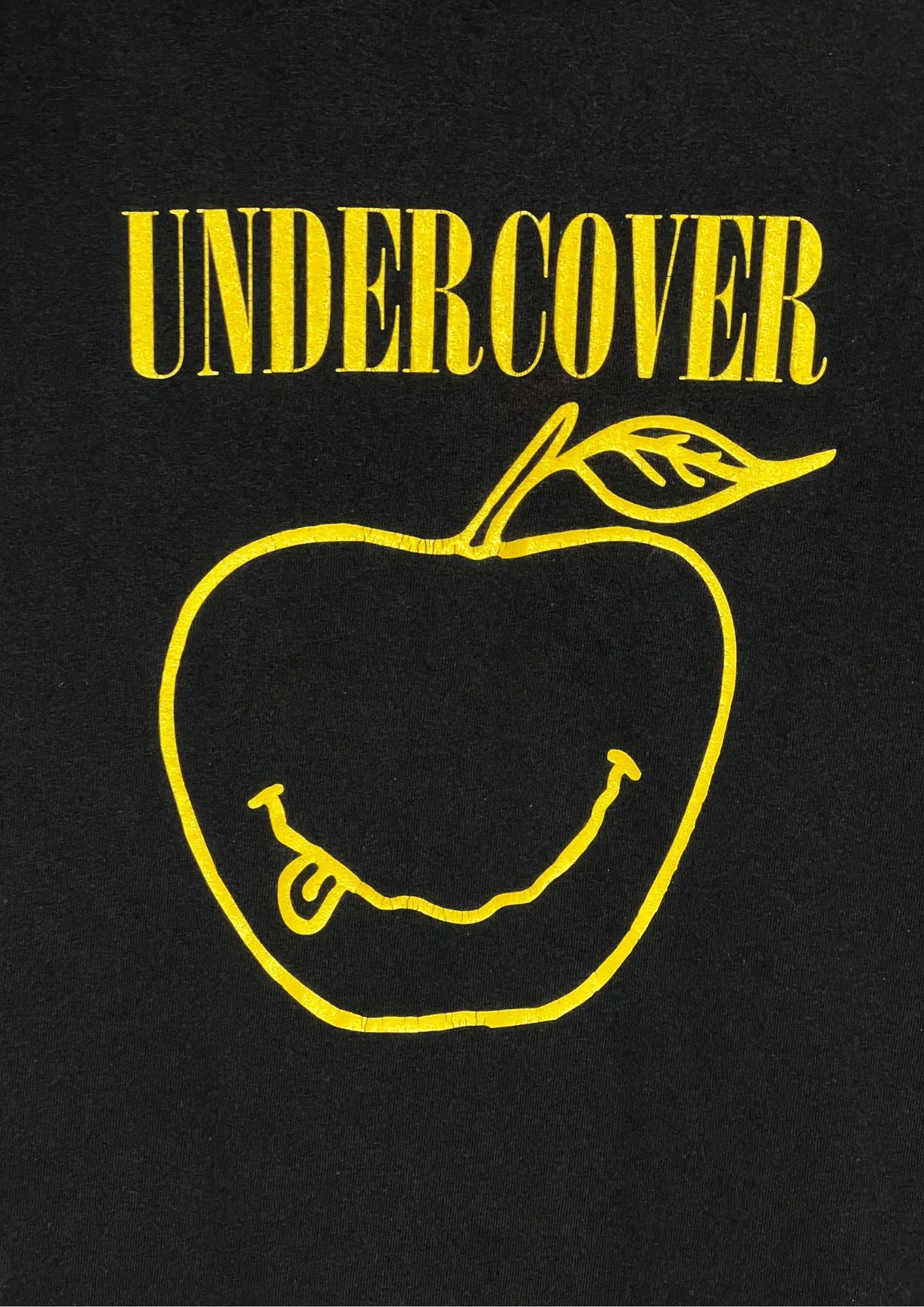 UNDERCOVER MADSTORE Nirvana Smiley Apple Reprint Model T-shirt